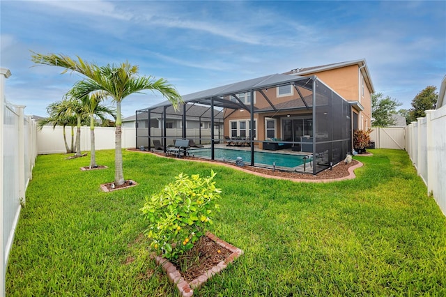 1601 Fox Grape Loop, Lutz, FL 33558 - rear view of property with a fenced backyard and a lanai