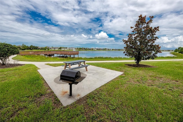 1601 Fox Grape Loop, Lutz, FL 33558 - view of home's community featuring a water view and a lawn