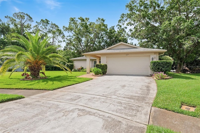 2875 Lomond Dr, Palm Harbor, FL 34684 - ranch-style home featuring concrete driveway, an attached garage, a front yard, and stucco siding