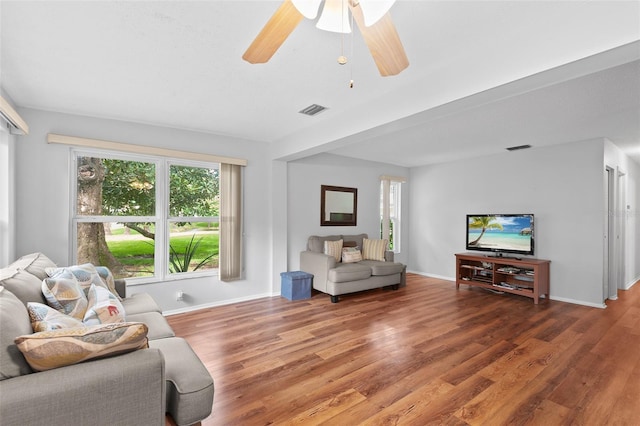 2875 Lomond Dr, Palm Harbor, FL 34684 - living room featuring wood finished floors and a ceiling fan