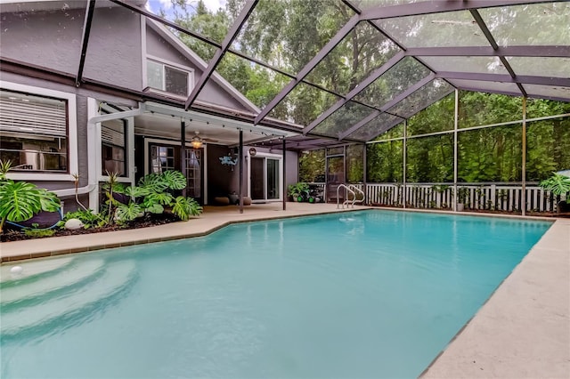 7320 Hideaway Trl, New Port Richey, FL 34655 - swimming pool featuring a ceiling fan, a lanai, and a patio