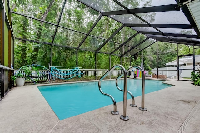 7320 Hideaway Trl, New Port Richey, FL 34655 - view of swimming pool featuring a patio area and a lanai