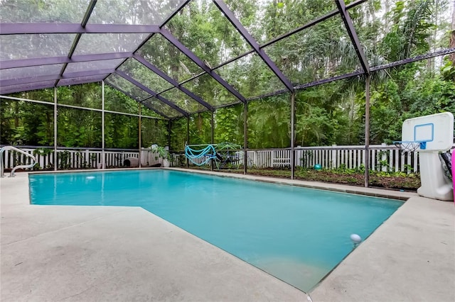 7320 Hideaway Trl, New Port Richey, FL 34655 - view of swimming pool with a lanai and a patio
