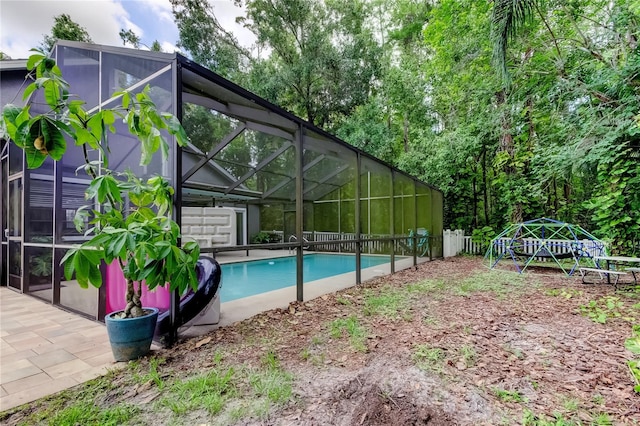 7320 Hideaway Trl, New Port Richey, FL 34655 - outdoor pool with glass enclosure