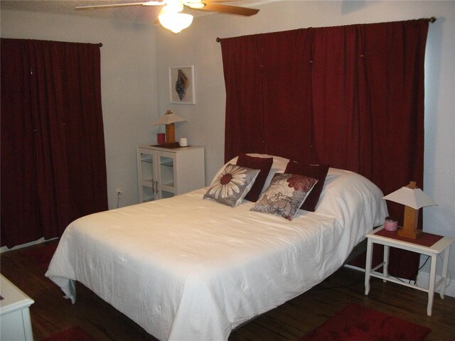 12411 Brookside St, Spring Hill, FL 34609 - bedroom with wood finished floors and ceiling fan