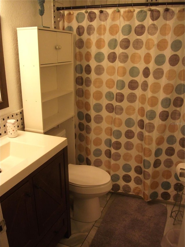 12411 Brookside St, Spring Hill, FL 34609 - full bath with vanity, tile patterned floors, and a shower with curtain
