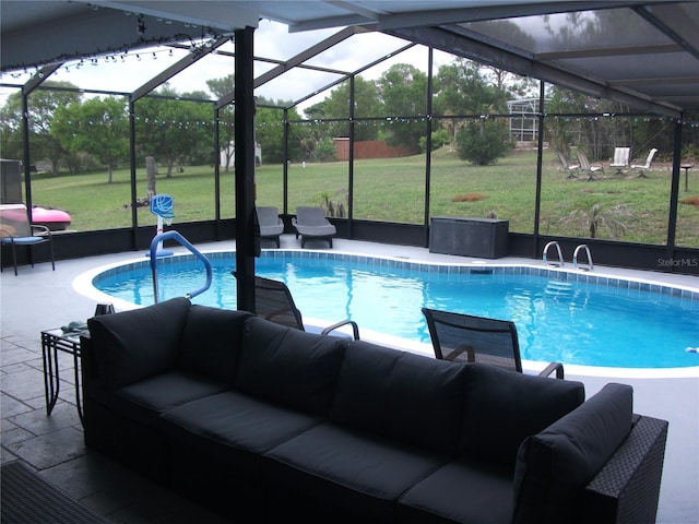 12411 Brookside St, Spring Hill, FL 34609 - outdoor pool with an outdoor living space, glass enclosure, a patio area, and a lawn