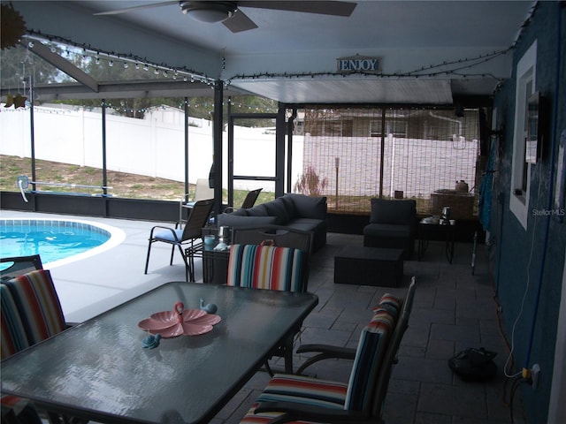 12411 Brookside St, Spring Hill, FL 34609 - fenced backyard featuring a patio, a ceiling fan, outdoor dining space, and a lanai