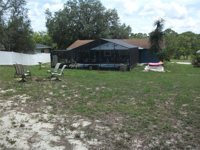 12411 Brookside St, Spring Hill, FL 34609 - view of yard featuring a trampoline