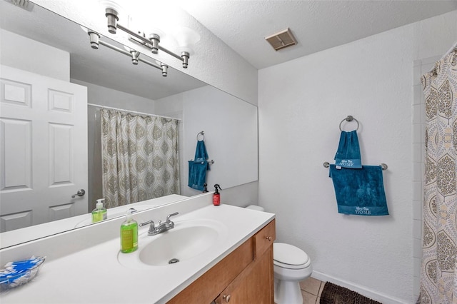 10195 Sailwinds Blvd N Unit 208, Largo, FL 33773 - full bathroom featuring vanity, tile patterned floors, and a shower with curtain