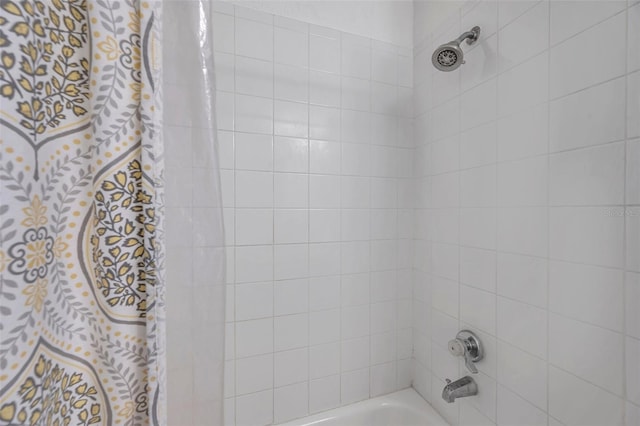 10195 Sailwinds Blvd N Unit 208, Largo, FL 33773 - bathroom featuring shower / bathtub combination with curtain