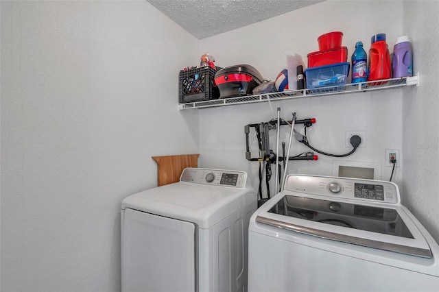 10195 Sailwinds Blvd N Unit 208, Largo, FL 33773 - washroom with independent washer and dryer and a textured ceiling