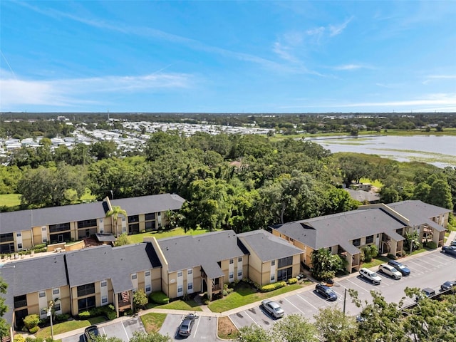 10195 Sailwinds Blvd N Unit 208, Largo, FL 33773 - aerial view of residential area featuring a nearby body of water and a tree filled landscape