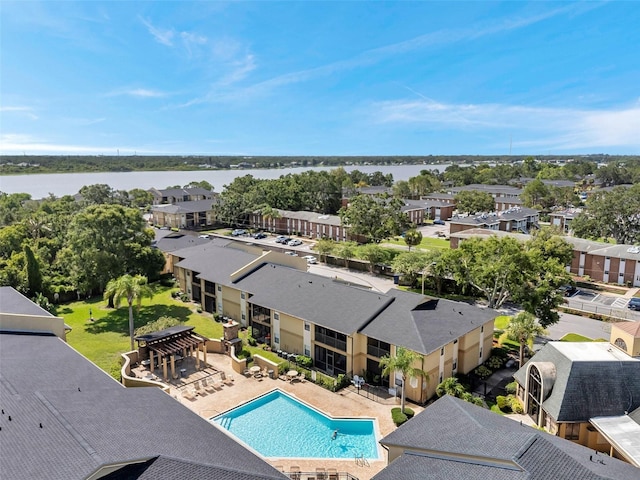 10195 Sailwinds Blvd N Unit 208, Largo, FL 33773 - outdoor pool with a patio, a water view, and a residential view
