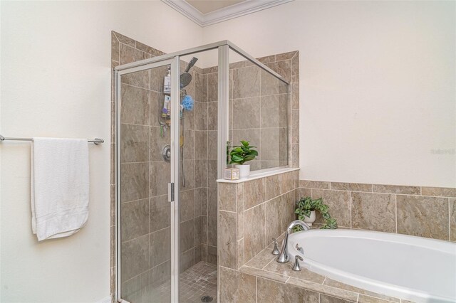 20828 Cattail Blvd, Venice, FL 34292 - bathroom featuring a garden tub, a shower stall, and ornamental molding