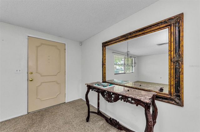 4143 Gray Squirrel Ln, New Port Richey, FL 34653 - carpeted foyer entrance with a textured ceiling and baseboards