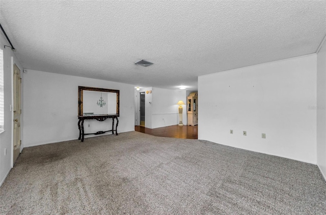 4143 Gray Squirrel Ln, New Port Richey, FL 34653 - carpeted spare room featuring a textured ceiling