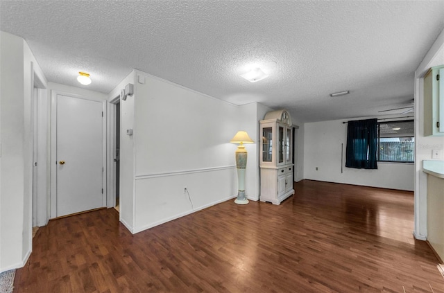 4143 Gray Squirrel Ln, New Port Richey, FL 34653 - spare room with wood finished floors and a textured ceiling