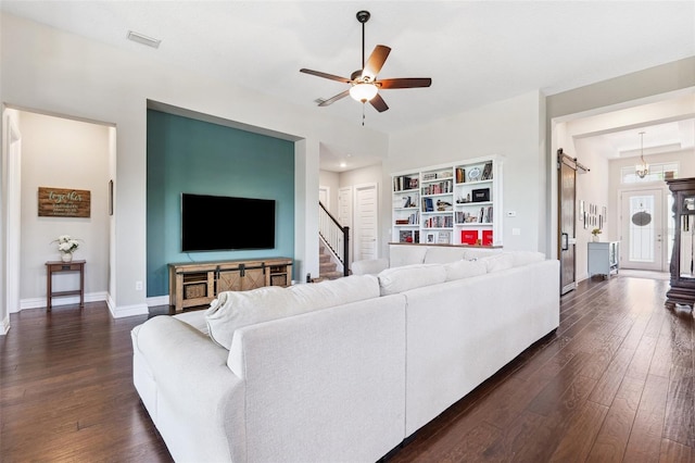 6007 Quartz Lake Way, Lithia, FL 33547 - living room with ceiling fan, dark wood-style flooring, and stairs