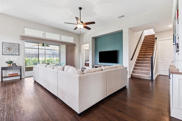 6007 Quartz Lake Way, Lithia, FL 33547 - living area featuring a ceiling fan, dark wood-type flooring, and stairway