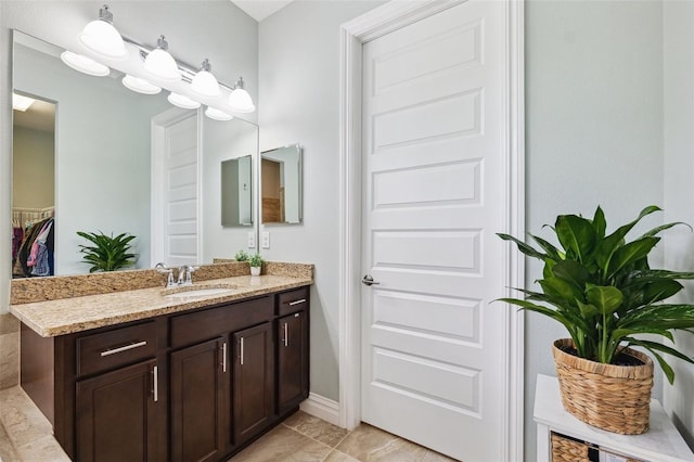 6007 Quartz Lake Way, Lithia, FL 33547 - bathroom with vanity and a spacious closet