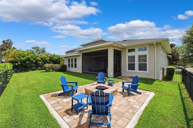6007 Quartz Lake Way, Lithia, FL 33547 - back of property with an outdoor fire pit, a sunroom, a patio, stucco siding, and a fenced backyard