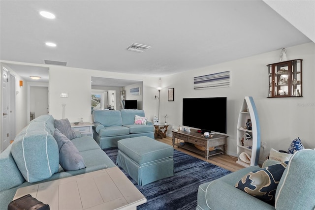 4252 Floramar Ter, New Port Richey, FL 34652 - living area with wood finished floors and recessed lighting