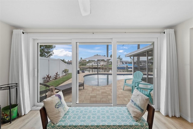 4252 Floramar Ter, New Port Richey, FL 34652 - doorway featuring light wood finished floors and a water view