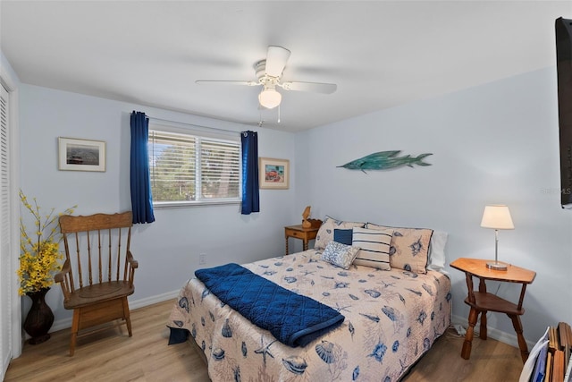4252 Floramar Ter, New Port Richey, FL 34652 - bedroom with wood finished floors, ceiling fan, and a closet