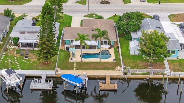 4252 Floramar Ter, New Port Richey, FL 34652 - aerial perspective of suburban area with a nearby body of water and a pool area