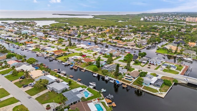 4252 Floramar Ter, New Port Richey, FL 34652 - aerial view of property and surrounding area featuring a nearby body of water and nearby suburban area