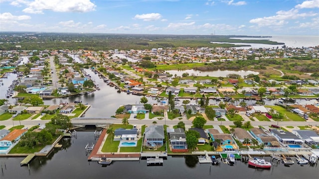 4252 Floramar Ter, New Port Richey, FL 34652 - aerial perspective of suburban area with a large body of water