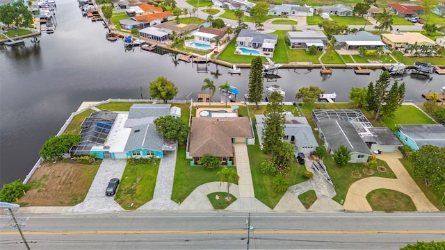 4252 Floramar Ter, New Port Richey, FL 34652 - aerial perspective of suburban area with a nearby body of water