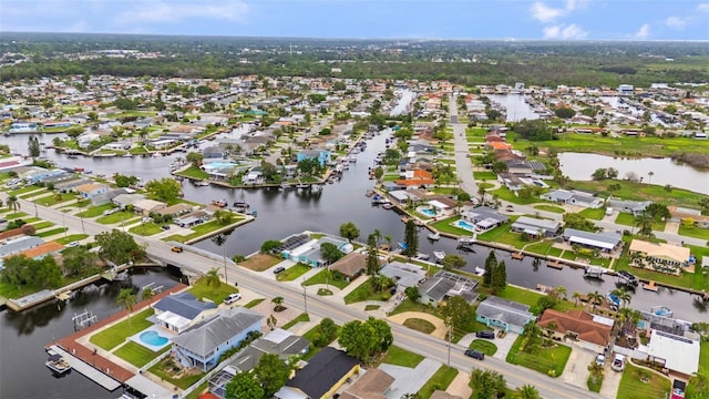 4252 Floramar Ter, New Port Richey, FL 34652 - aerial overview of property's location featuring nearby suburban area and a nearby body of water