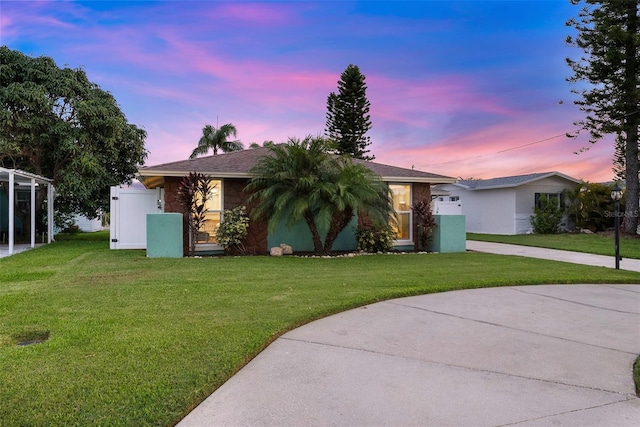 4252 Floramar Ter, New Port Richey, FL 34652 - ranch-style home featuring a front yard