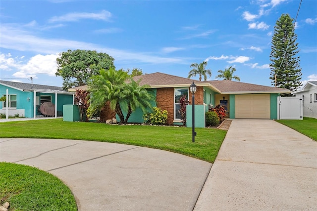 4252 Floramar Ter, New Port Richey, FL 34652 - ranch-style house featuring an attached garage, concrete driveway, stone siding, and a gate