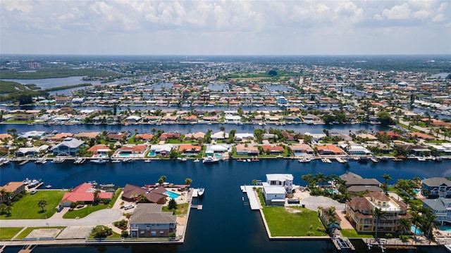 4252 Floramar Ter, New Port Richey, FL 34652 - aerial view of residential area featuring a nearby body of water