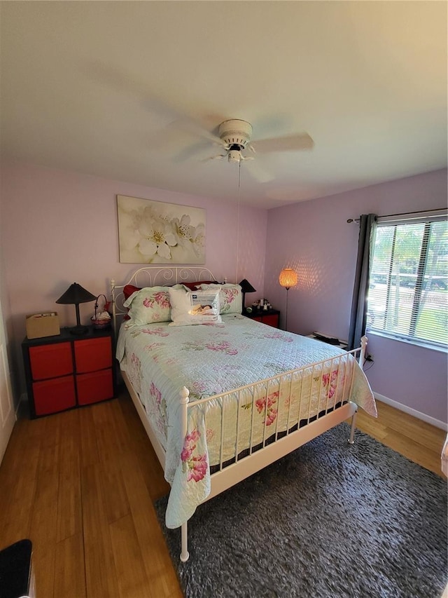 2685 Sabal Springs Cir Unit 202, Clearwater, FL 33761 - bedroom featuring wood finished floors and ceiling fan