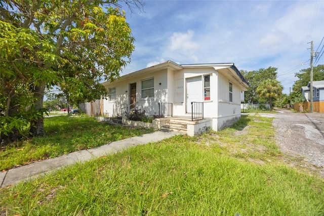 1919 Dr Martin Luther King Jr St S Unit J, Saint Petersburg, FL 33705 - view of front of home with dirt driveway