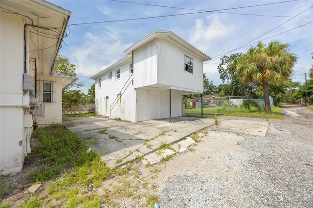1919 Dr Martin Luther King Jr St S Unit J, Saint Petersburg, FL 33705 - view of side of home with driveway