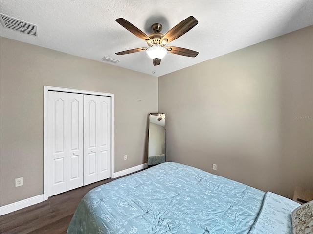 4079 Pacente Loop, Wesley Chapel, FL 33543 - bedroom with wood finished floors, a closet, and ceiling fan