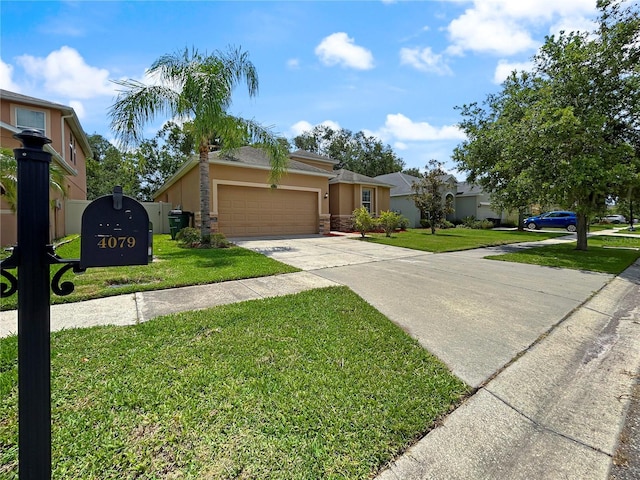 4079 Pacente Loop, Wesley Chapel, FL 33543 - view of front facade with stucco siding, driveway, an attached garage, and a front lawn