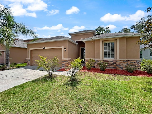 4079 Pacente Loop, Wesley Chapel, FL 33543 - prairie-style home featuring stucco siding, concrete driveway, an attached garage, stone siding, and a front lawn