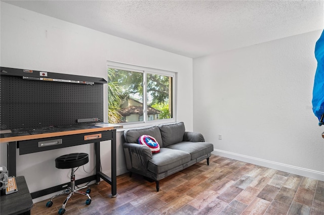 2095 Sunset Point Rd Unit 2201, Clearwater, FL 33765 - office featuring wood finished floors and a textured ceiling