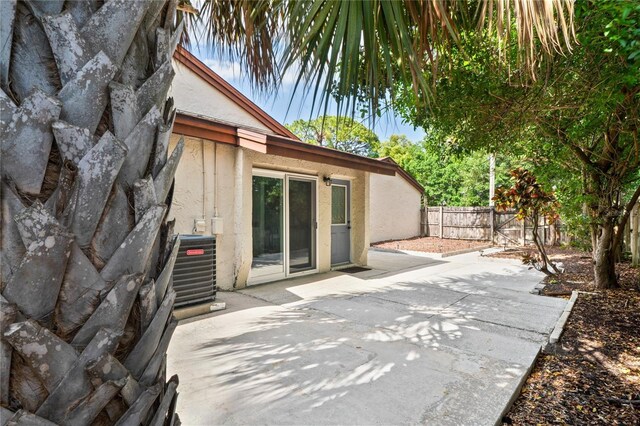 2095 Sunset Point Rd Unit 2201, Clearwater, FL 33765 - fenced backyard with a patio area