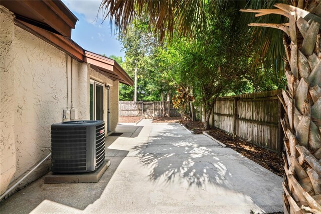 2095 Sunset Point Rd Unit 2201, Clearwater, FL 33765 - fenced backyard featuring a patio area
