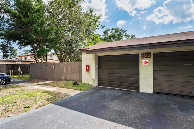 2095 Sunset Point Rd Unit 2201, Clearwater, FL 33765 - garage featuring driveway