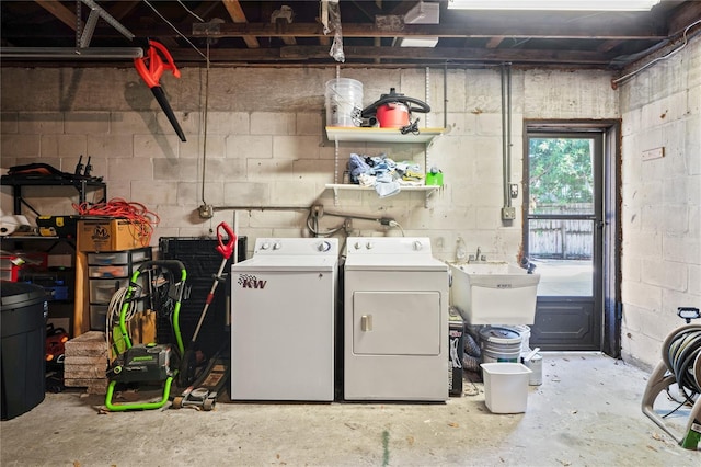 2095 Sunset Point Rd Unit 2201, Clearwater, FL 33765 - laundry area with washer and clothes dryer and concrete block wall