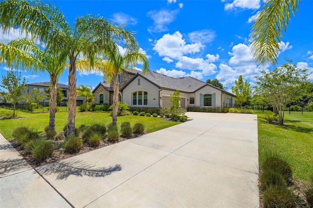 2839 Cordoba Ranch Blvd, Lutz, FL 33559 - view of front of home with concrete driveway, stucco siding, a garage, and a front yard