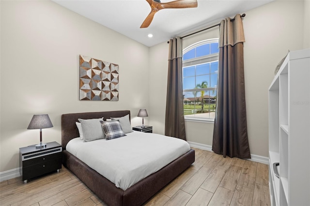 2839 Cordoba Ranch Blvd, Lutz, FL 33559 - bedroom with light wood-style flooring, recessed lighting, and ceiling fan